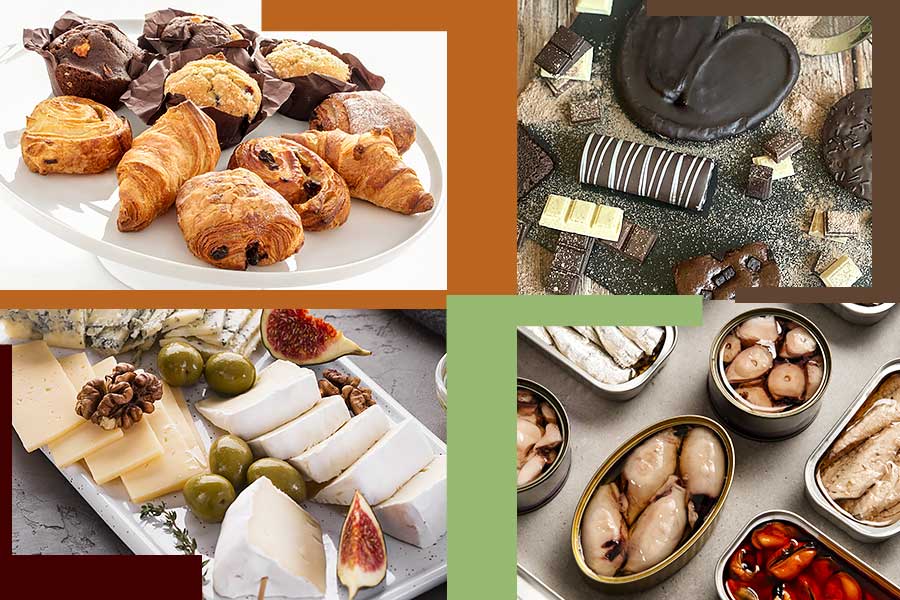 Surtido de bollería, quesos, conservas y chocolate de marcas de alimentación.